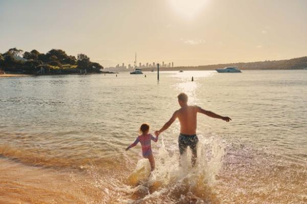 Harbour beach Camp Cove’s placid waters.