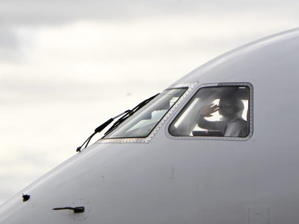 A pilot in the cockpit of a Finnair aircraft at Helsinki Airport in October 2016.