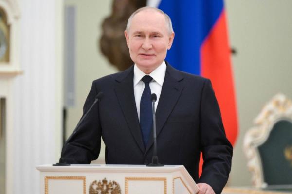 Russian President Vladimir Putin speaks during a ceremony to award young scientists at the Kremlin in Moscow on Thursday.