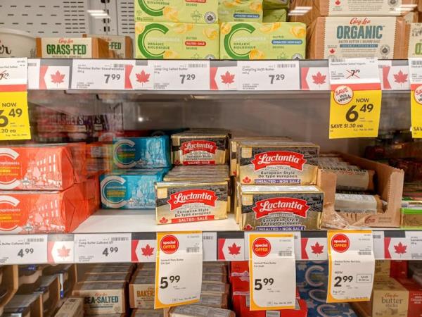 A shelf full of butter products, with labels designating that they've been made in Canada.